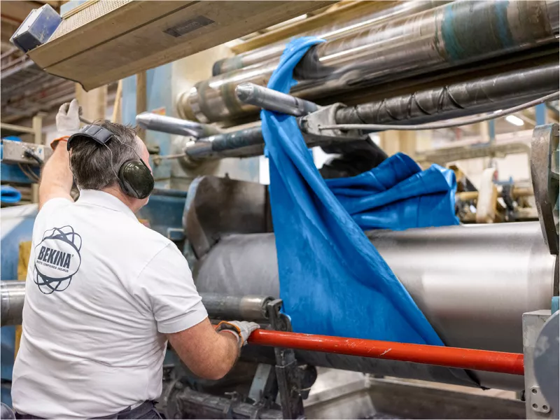  Bekina Compounds Compounding cutting the material.jpg 